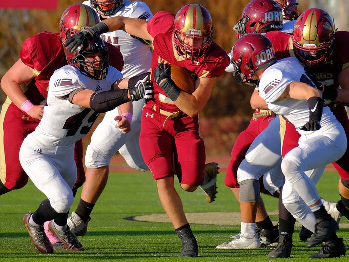 (Leah Hogsten  |  The Salt Lake Tribune) Viewmont's Jacob Shaver runs for a first down. Jordan High School boys' football team defeated Viewmont High School 28-20 during their class 5A football playoff opener, Friday, October 27, 2017 in Bountiful.