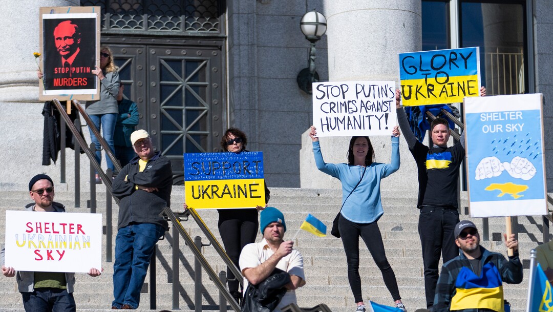 (Rick Egan | The Salt Lake Tribune) Protesters stand on the steps of the Capitol, during a rally against Russia's invasion of Ukraine, organized by the Utah Ukrainian association, on Saturday, March 12, 2022.