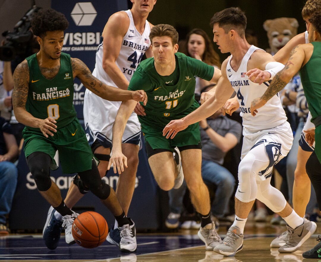 (Rick Egan  |  The Salt Lake Tribune)    San Francisco Dons guard Khalil Shabazz (0) and San Francisco Dons forward Remu Raitanen (11) go for a loose ball along with Brigham Young Cougars guard Alex Barcello (4), in WCC basketball acton between the Brigham Young Cougars and the San Francisco Dons, at the Marriott Center, Saturday, Feb. 8, 2020.