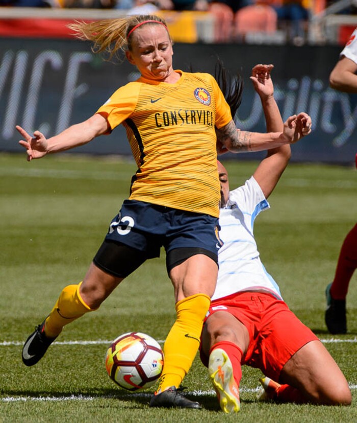 (Trent Nelson | The Salt Lake Tribune)  
Utah Royals FC hosts the Chicago Red Stars, at Rio Tinto Stadium in Sandy, Saturday April 14, 2018. Utah Royals FC midfielder Gunnhildur Jónsdóttir (23) is tripped up by Chicago Red Stars defender Samantha Johnson (16).