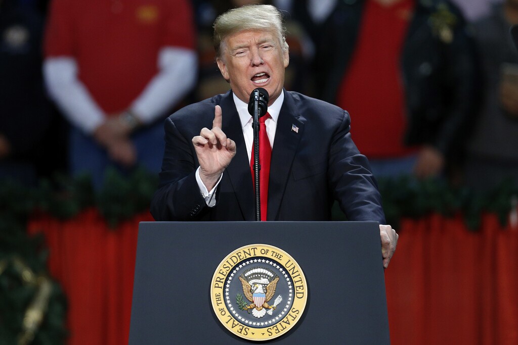 President Donald Trump speaks during a rally in Pensacola, Fla., Friday, Dec. 8, 2017. (AP Photo/Jonathan Bachman)