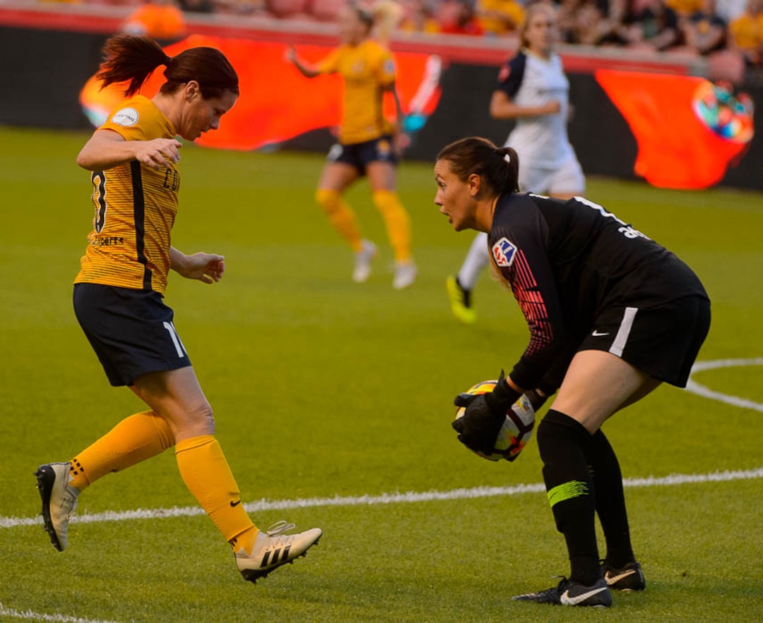 (Trent Nelson | The Salt Lake Tribune)  Utah Royals FC host North Carolina Courage, NWSL soccer at Rio Tinto Stadium in Sandy, Friday July 20, 2018. Utah Royals FC midfielder Diana Matheson (10) and North Carolina Courage goalkeeper Katelyn Rowland (0).