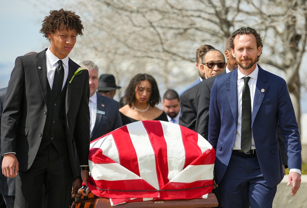 (Chris Samuels | The Salt Lake Tribune) Jason Love, right, and his son, Peyton, lead pallbearers to a flag ceremony for former U.S. Rep. Mia Love at the University of Utah Institute of Religion in Salt Lake City, Monday, April 7, 2025.