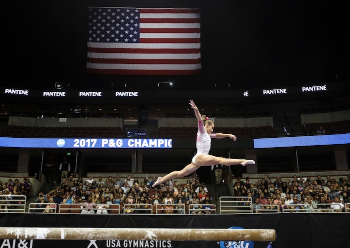 Ragan Smith competes on the balance beam during women's U.S. gymnastics championships Sunday, Aug. 20, 2017, in Anaheim, Calif. (AP Photo/Ringo H.W. Chiu)