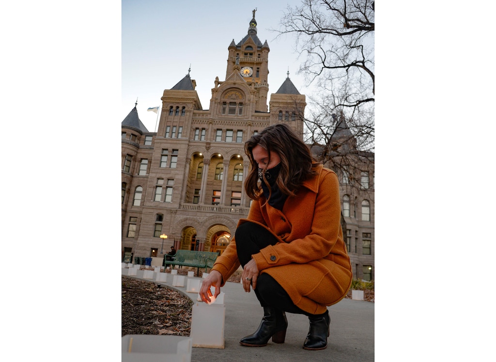 (Francisco Kjolseth | The Salt Lake Tribune) Salt Lake City Mayor Erin Mendenhall helps light lanterns to commemorate the city’s victims and survivors of COVID-19 just outside Salt Lake City Hall, Monday evening, March 1, 2021, before being joined by City Council members.