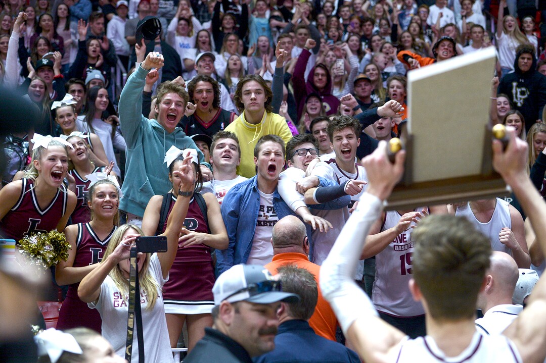 (Leah Hogsten  |  The Salt Lake Tribune) Lone Peak celebrates the win. Lone Peak defeated Pleasant Grove 61-44 to win the 6A High School BoysÕ Basketball Tournament Championship at the Jon M. Huntsman Center in Salt Lake City, Saturday, March 3, 2018. 