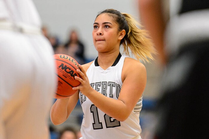 (Trent Nelson | The Salt Lake Tribune)  Riverton's Jaydeene Burgess (12) hits a three-pointer as Riverton faces American Fork in the 6A High School Girls' Basketball Tournament at SLCC in Taylorsville, Tuesday Feb. 20, 2018.