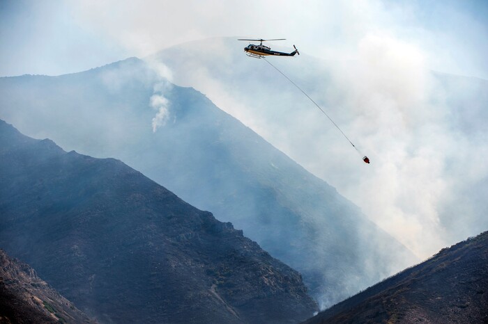 (Rick Egan  |  The Salt Lake Tribune) Crews battle the Green Ravine fire as it continues to burn near Tooele, Wednesday, Sept. 4, 2019.