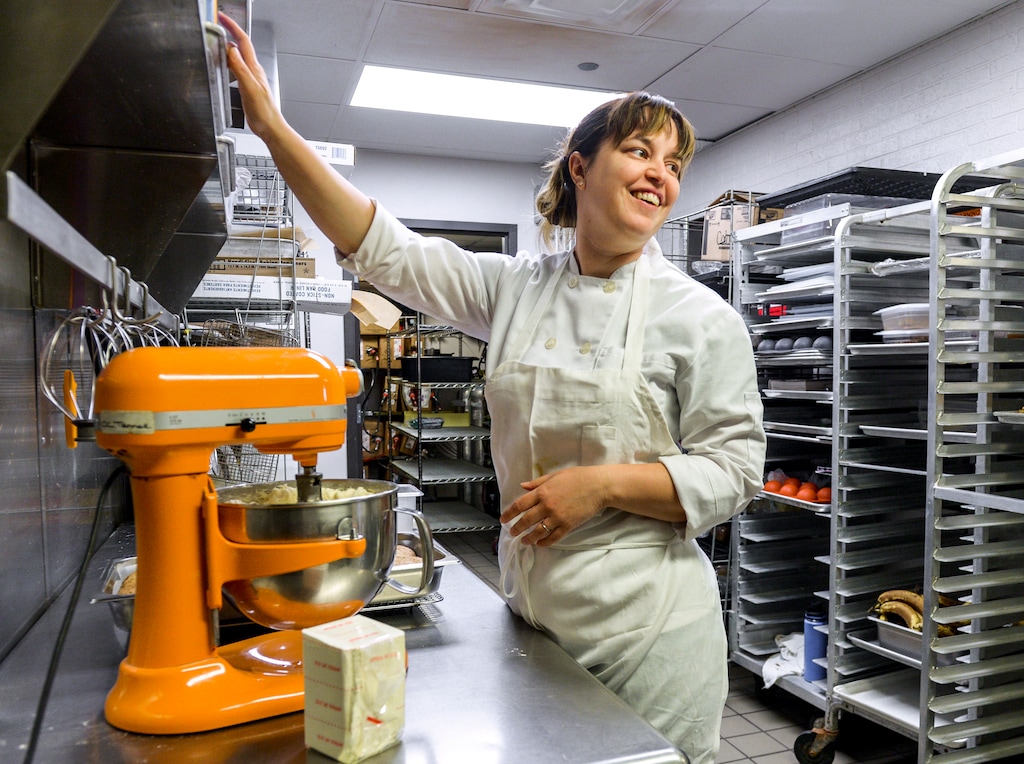 (Leah Hogsten | The Salt Lake Tribune) Pastry chef Kristina Fox whips up a batch of frosting to top the sheet of carrot cake she made earlier from scratch at O.C. Tanner's company restaurant, Trebo, Oct. 19, 2018.
O.C. Tanner is keeping their employees comforted through their stomachs. Trebo, an on-site restaurant that serves hearty breakfasts and lunches made from scratch and serves snacks and free drinks all day.