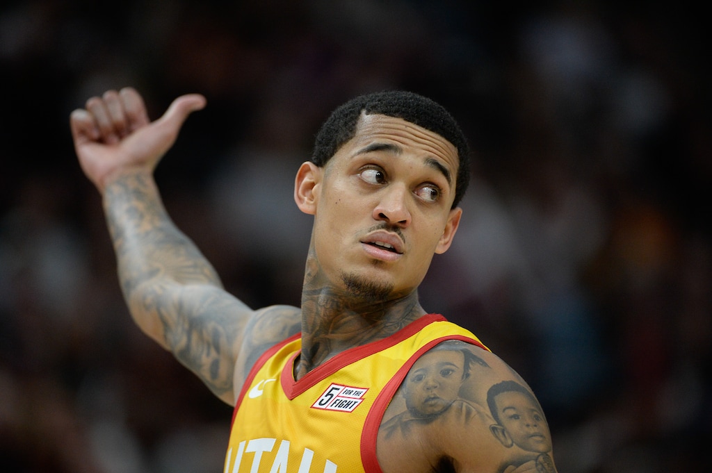 (Francisco Kjolseth | The Salt Lake Tribune) Utah Jazz guard Jordan Clarkson (00) hitches a ride or confers with teammates as the Utah Jazz host the Detroit Pistons in their NBA basketball game at Vivint Smart Home Arena in Salt Lake City on Monday, Dec. 30, 2019.