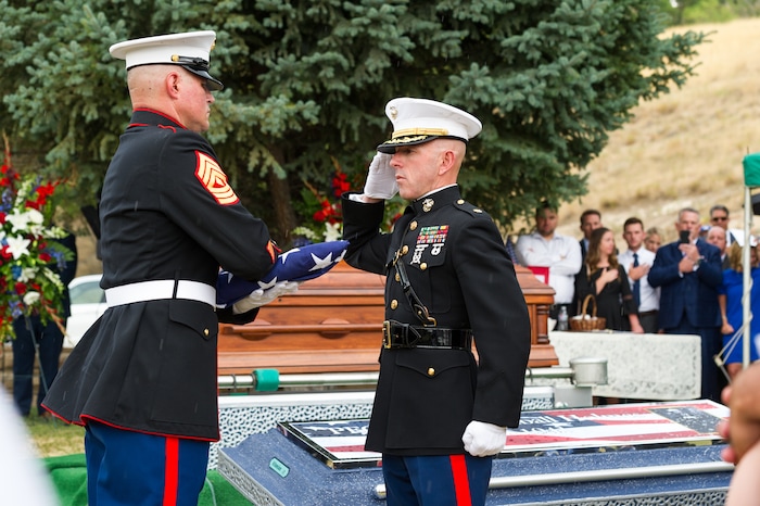 (Alex Gallivan  |  Special to The Tribune) Marine Pfc. Robert K. Holmes, who died 77 years ago aboard the USS Oklahoma during the attack on Pearl Harbor, is laid to rest in the Salt Lake City Cemetery, Monday, Aug. 20, 2018.