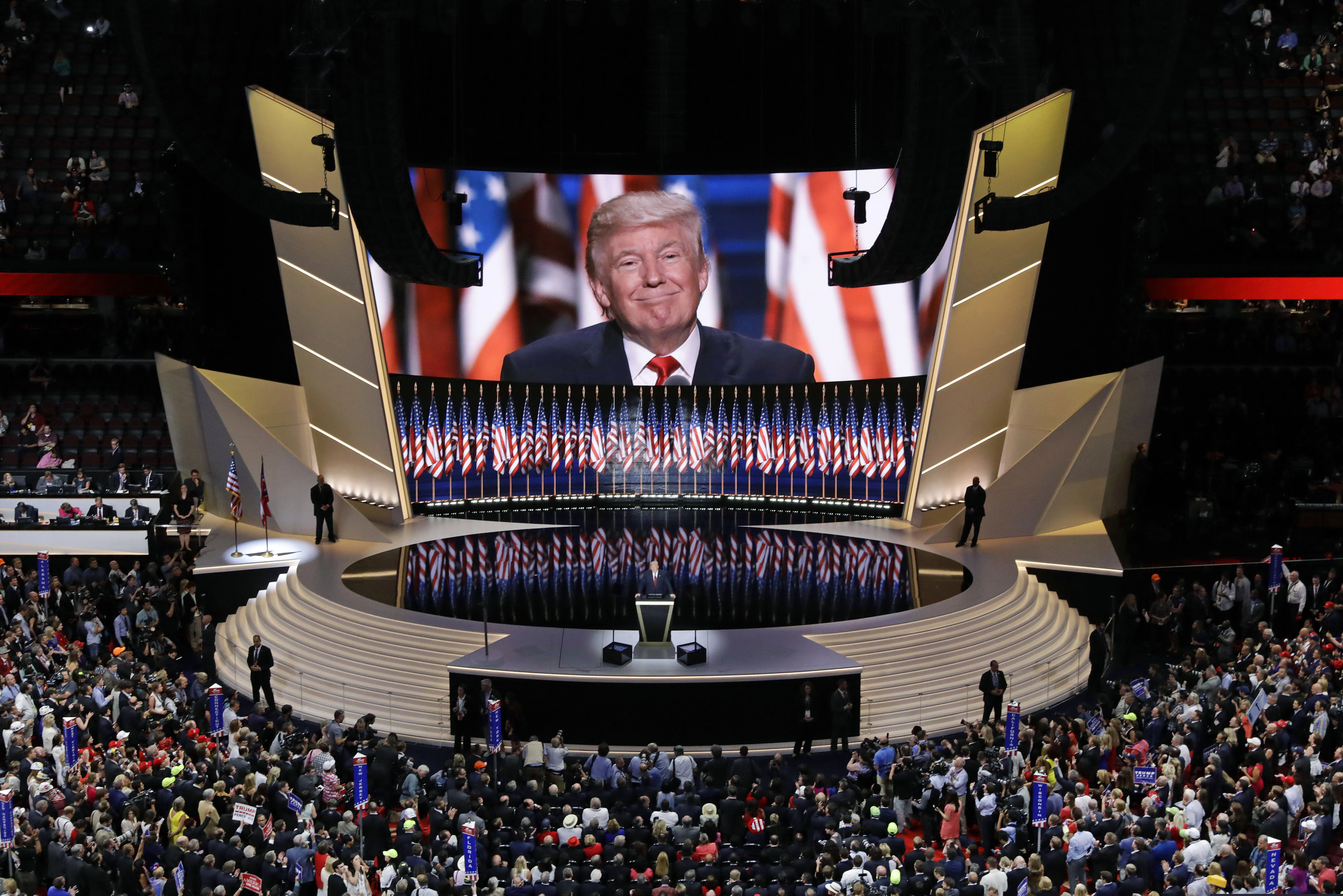 (AP Photo/Patrick Semansky, File) - In this July 21, 2016, file photo Republican presidential candidate Donald Trump smiles as he addresses delegates during the final day session of the Republican National Convention in Cleveland. Salt Lake City is one of several cities bidding to host the 2024 convention.