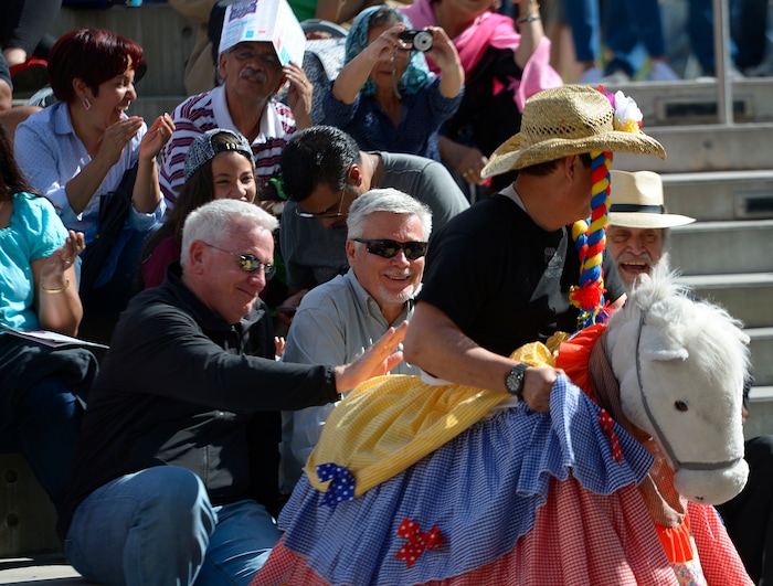 Leah Hogsten  |  The Salt Lake TribuneThe crowd laughs at the antics of Richard Sanchez, riding his little donkey during the "La Burrito" dance at the Living Traditions Festival, a three-day multicultural festival celebrating the traditional music, dance, crafts and foods of Salt Lake CityÕs ethnic communities, Saturday, May 21, 2016.