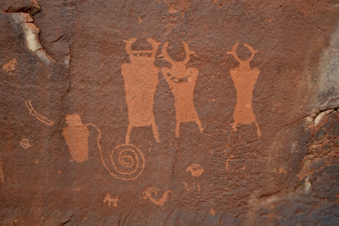 (photo courtesy Manny Mellor) Petroglyphs are seen near Hole in the Rock.
