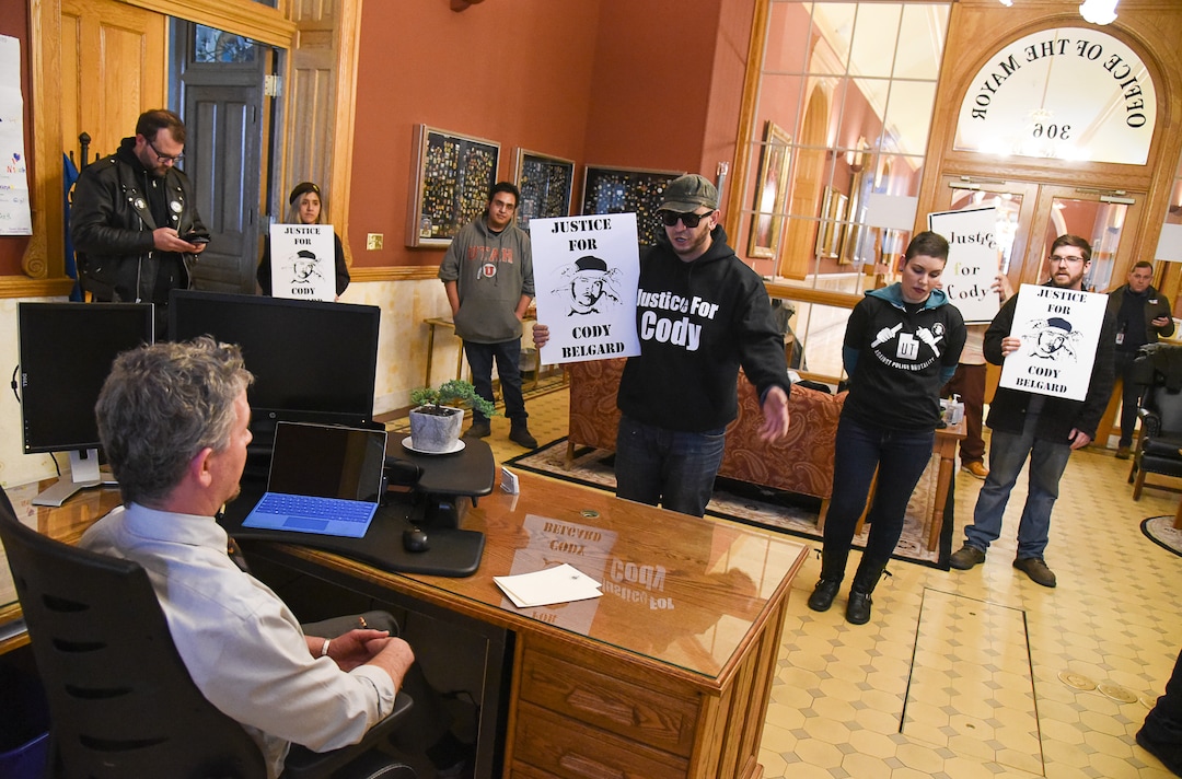 (Francisco Kjolseth  |  The Salt Lake Tribune)  Patrick Leary, chief of staff for Mayor Jackie Biskupski remains completely silent for over an hour as members of Utah Against Police Brutality and family of Cody Belgard, the popular Glendale rapper, who was shot by police last November, organize a sit-in at the office of mayor trying to get him to schedule a future meeting on Thursday, Jan. 10, 2019. For weeks, the family of Cody Belgard has asked to meet with Mayor Biskupski to discuss his shooting by SLCPD, to no avail.