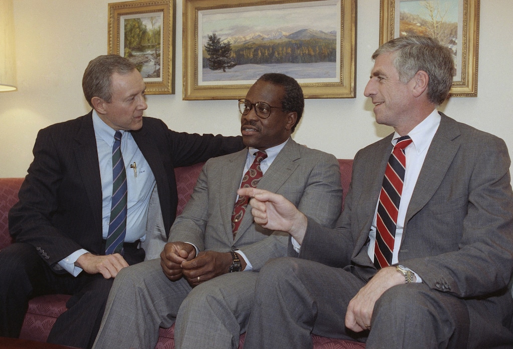 (John Duricka  |  AP Photo)  Federal Judge Clarence Thomas, center, meets with Senators Orrin Hatch, R-Utah, left, and John Danforth, R-Missouri on Capitol Hill in Washington, Thursday, July 12, 1991. The post is subject to Senate confirmation.