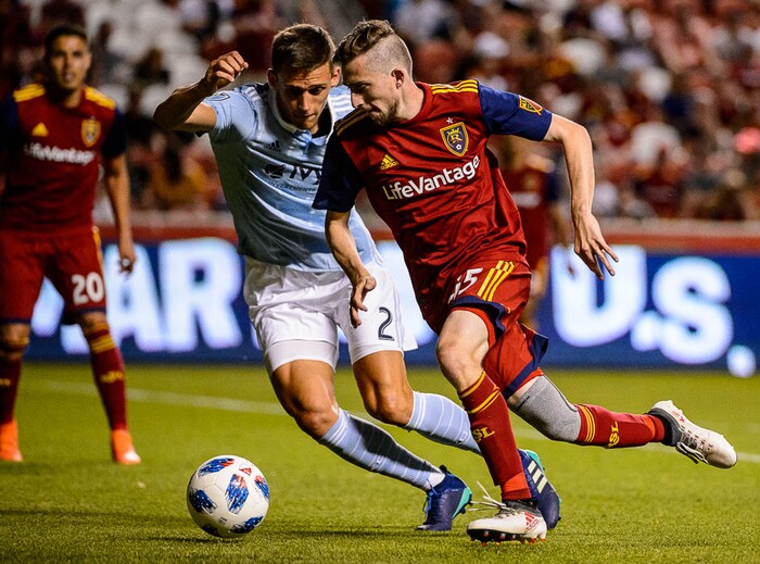 (Trent Nelson | The Salt Lake Tribune)
Andrew Brody and Sporting Kansas City defender Amer Didic (2) as Real Salt Lake hosts Sporting Kansas City in a U.S. Open Cup match in Sandy, Wednesday June 6, 2018.