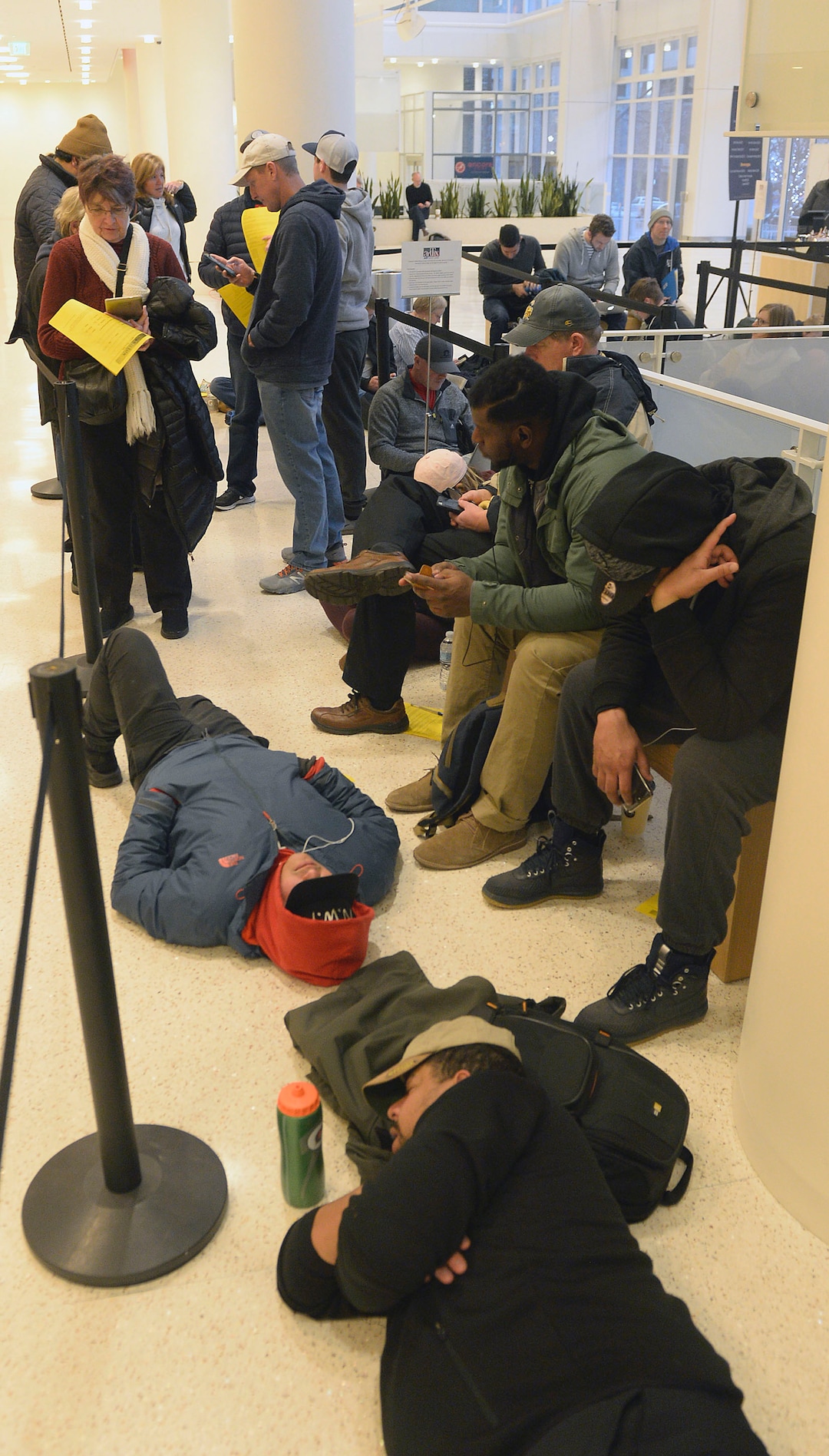 (Al Hartmann  |  The Salt Lake Tribune) 	About 150 people wait in the lobby of the Eccles Theater at 7:30 a.m. Feb. 9 to buy tickets for the upcoming production of "Hamilton".  