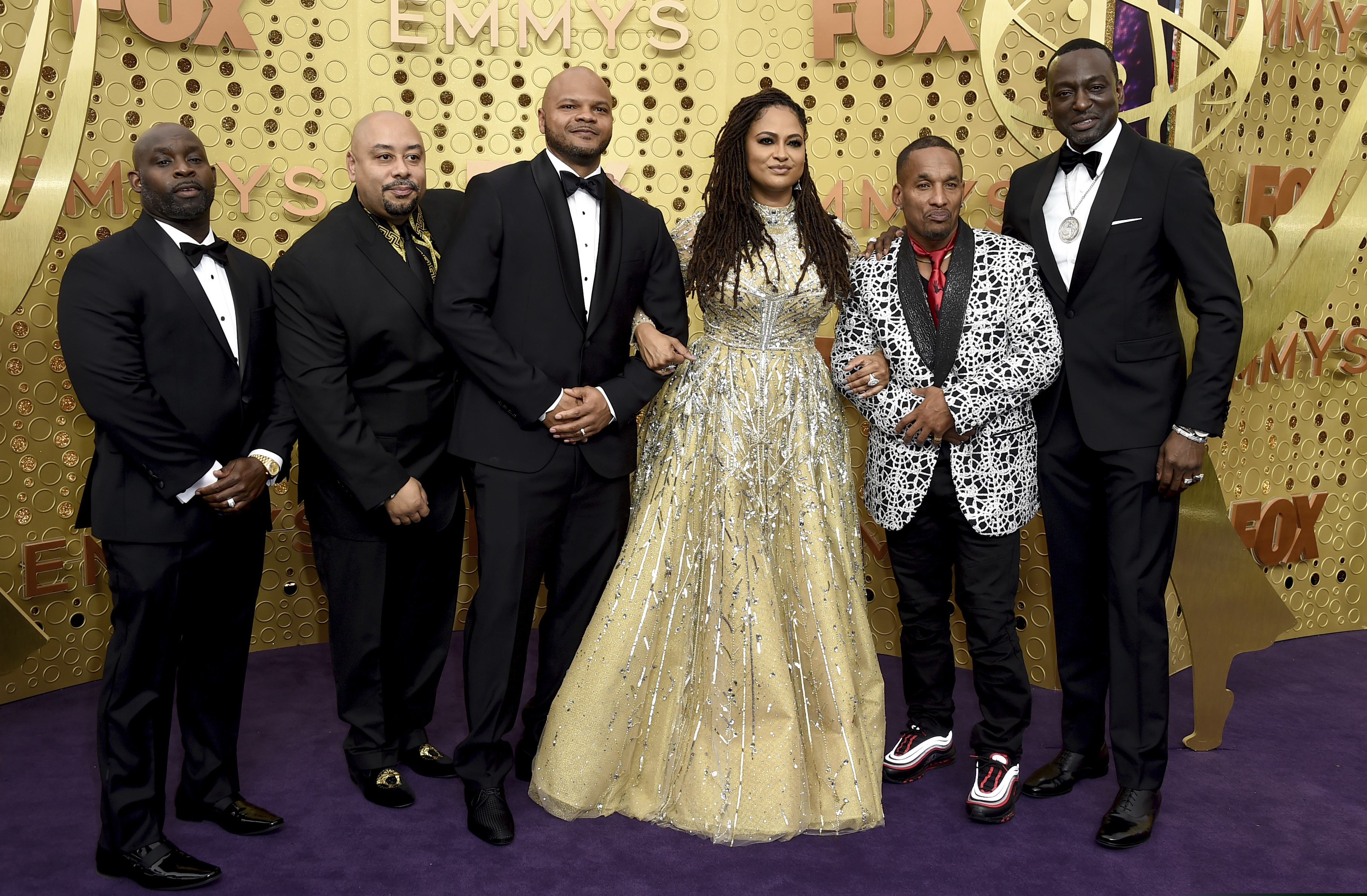 Ava DuVernay, center, is joined by Antron McCray ,Raymond Santana, Kevin Richardson, Korey Wise and Yusef Salaam, of the Central Park 5, during arrivals of the 71st Primetime Emmy Awards on Sunday, Sept. 22, 2019, at the Microsoft Theater in Los Angeles. (Photo by Jordan Strauss/Invision/AP)