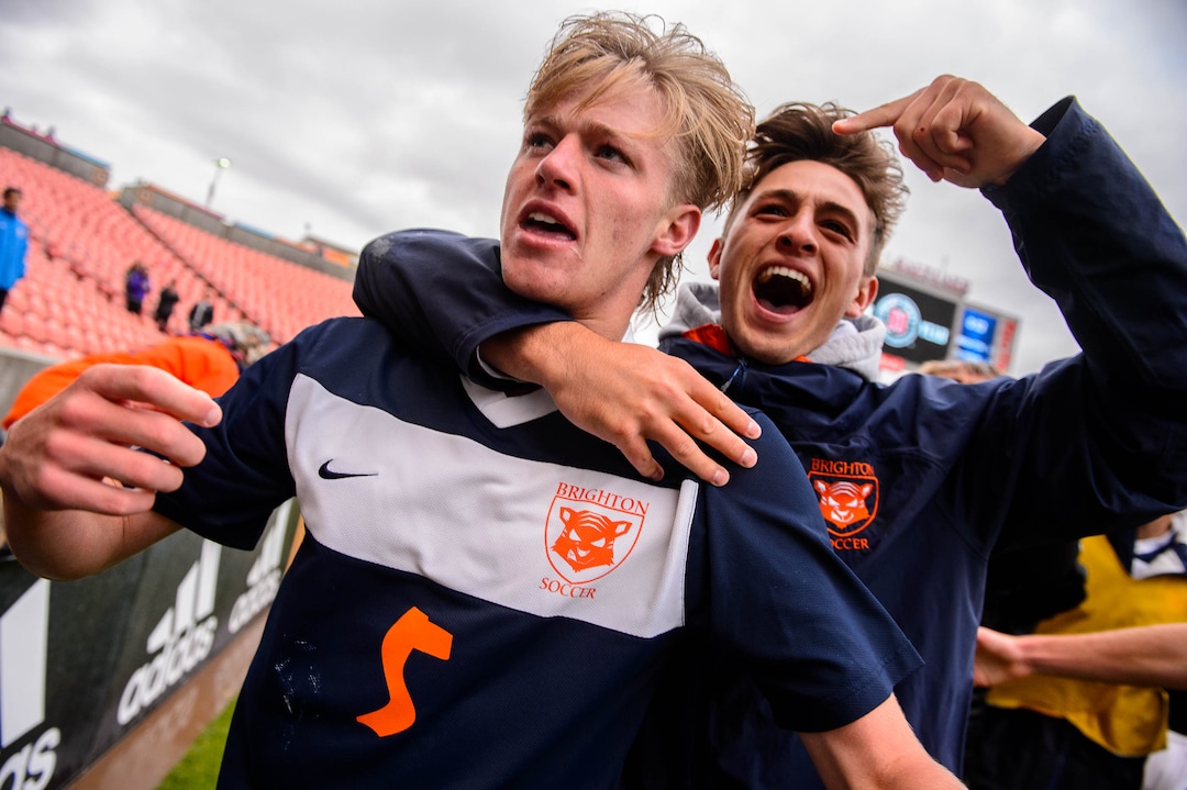 (Trent Nelson  |  The Salt Lake Tribune)  Brighton players celebrate after defeating Olympus High School 3-2 in overtime in the 5A boys state championship game at Rio Tinto Stadium in Sandy, Thursday May 23, 2019. At left is Brighton's Braxton Jones (5).