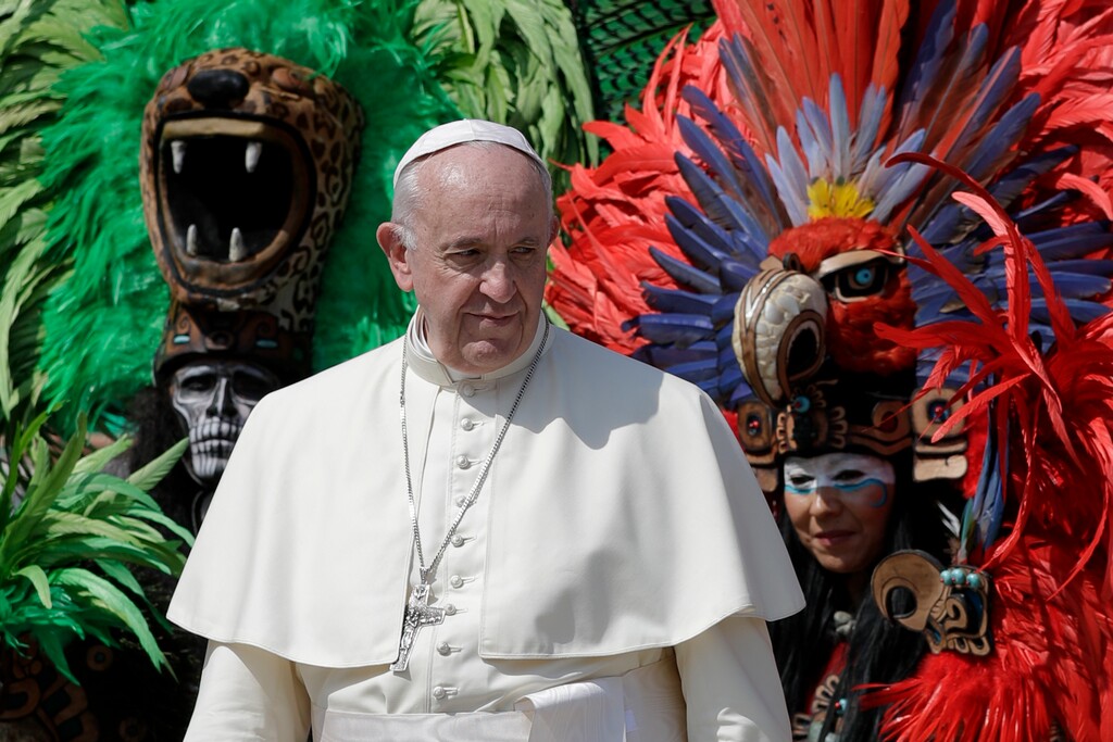(AP Photo/Andrew Medichini) Pope Francis poses for photos with a group from Mexico wearing traditional clothes during his weekly general audience at the Vatican on Wednesday, Aug. 29, 2018.