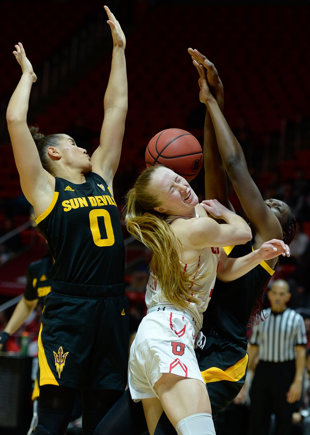 (Francisco Kjolseth  |  The Salt Lake Tribune)  Arizona State Sun Devils guard Taya Hanson (0) and Arizona State Sun Devils forward Sophia Elenga (21) put the squeeze on Utah Utes guard Dru Gylten (10) in Utes' Pac-12 home opener at the Jon M Huntsman Center on Friday, Jan. 4, 2019. Off to one of their best starts in team history, their twelve in a row winning streak came to an end losing to the Sun Devils 63-65.ir twelve in a row winning streak came to an end losing to the Sun Devils 63-65.