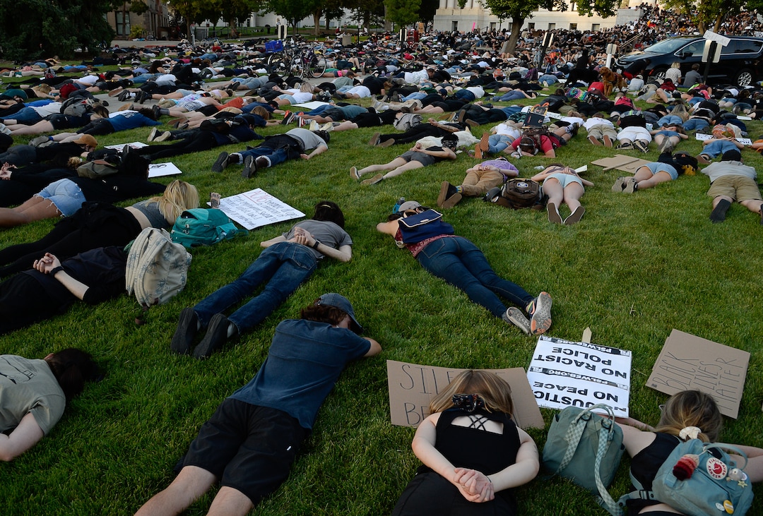 (Francisco Kjolseth  |  The Salt Lake Tribune) Demonstrators protesting against police brutality lay down in silence in honor of George Floyd on President's Circle at the University of Utah on Wednesday, June 3, 2020, in Salt Lake City, as the initially set 8 p.m. weeklong curfew was removed.