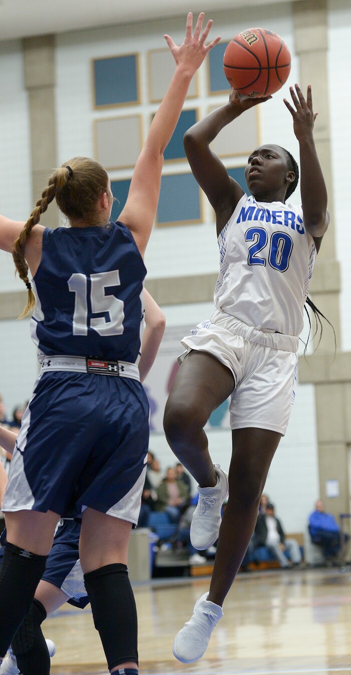 (Leah Hogsten  |  The Salt Lake Tribune)  Bingham's Shanyce Makuei (20) had five rebounds and five points. Bingham defeated Copper Hills 48-40 in their semifinal game of the 6A High School Girls' Basketball Tournament at SLCC in Taylorsville, Friday, Feb. 23, 2018. 
