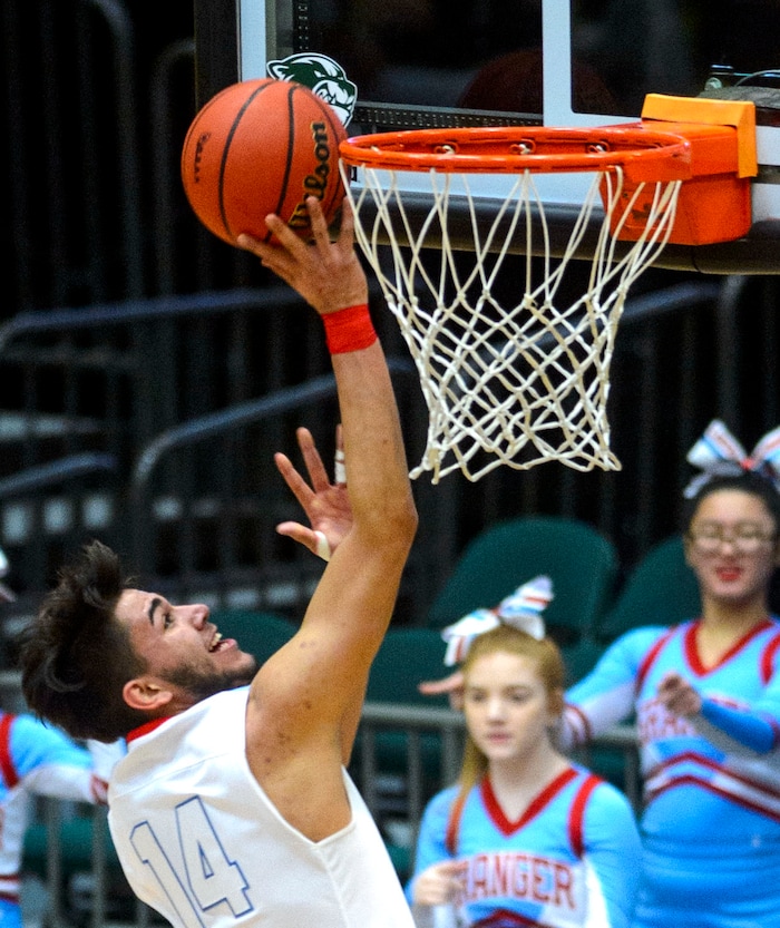 (Steve Griffin  |  The Salt Lake Tribune) Granger's Jason Murillo scores during their 6A basketball playoff game against Davis at Utah Valley UniversityÕs UCCU Center in Provo Tuesday Feb. 27, 2018.