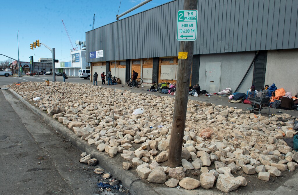 (Rick Egan | The Salt Lake Tribune) The grass park strip, where unsheltered people used to pitch their tents, has been replaced by giant rocks on the corner of 700 South and State Street, on Tuesday, Feb. 23, 2021.