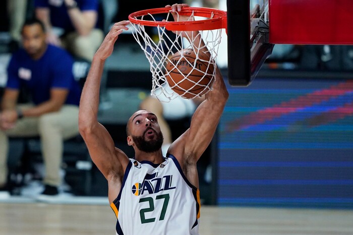 Utah Jazz's Rudy Gobert (27) dunks against the Oklahoma City Thunder during the second half of an NBA basketball game Saturday, Aug. 1, 2020, in Lake Buena Vista, Fla. (AP Photo/Ashley Landis, Pool)