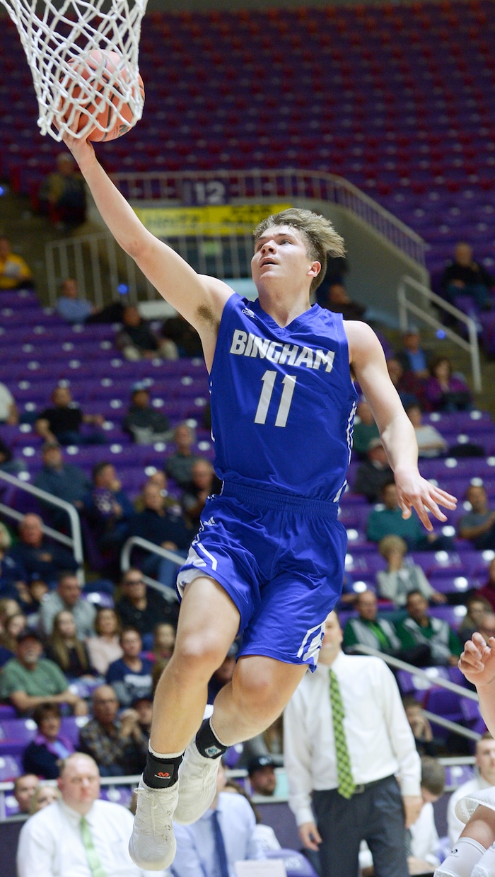 (Leah Hogsten  |  The Salt Lake Tribune) Bingham's Dalton Miller (11) aims for the net on a fast break steal. Miller had 5 points and 3 rebounds in the first half. Copper Hills faces Bingham in the 6A High School Boys' Basketball Tournament opening game at Weber State University’s Dee Events Center in Ogden, Tuesday, Feb. 27, 2018. 