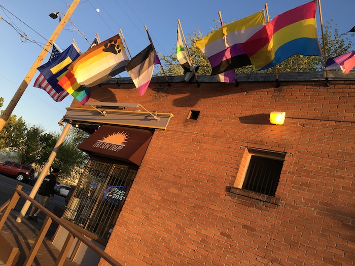 Flags outside Salt Lake City gay bar the Sun Trapp, representing many facets of LGBT culture.