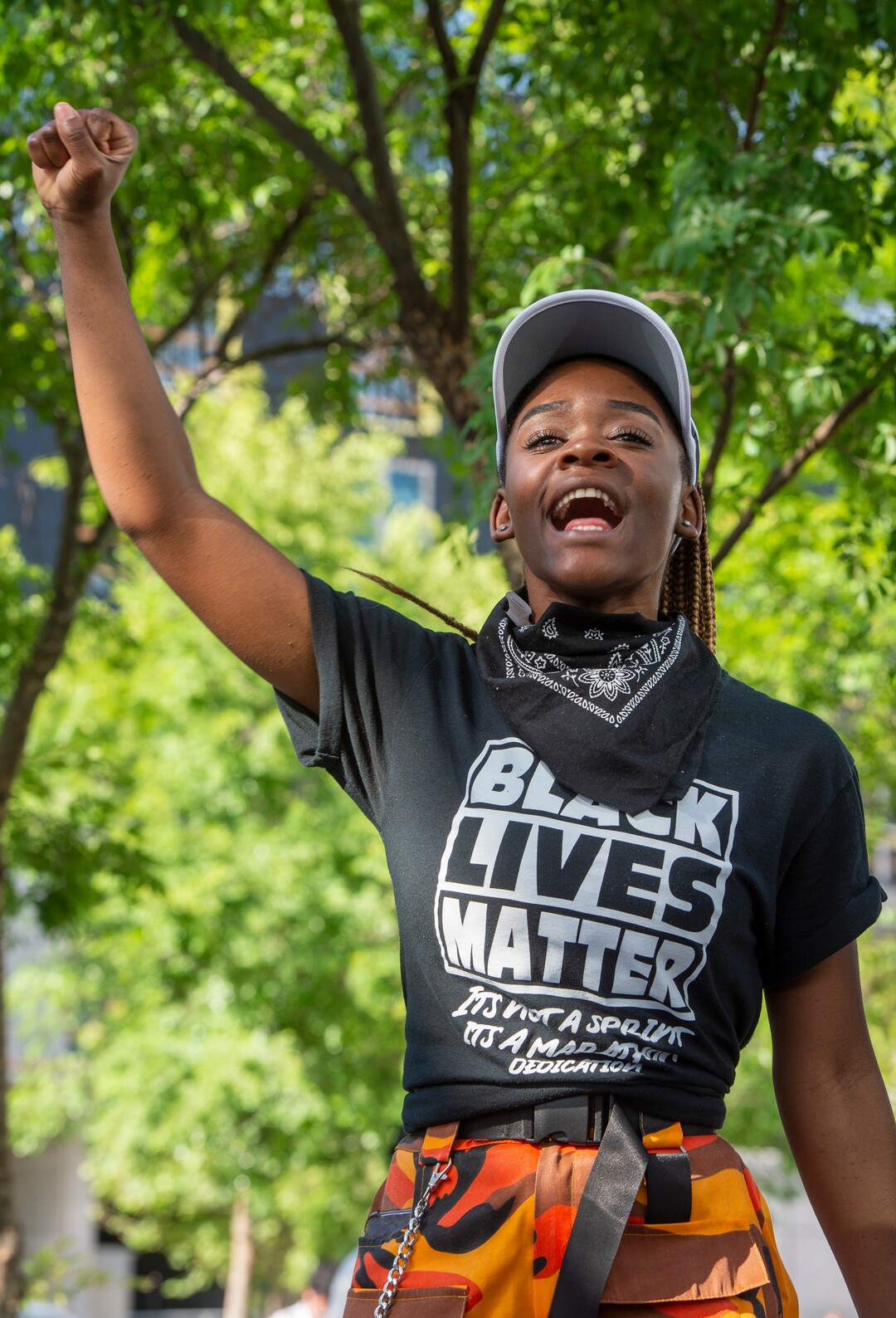 ((Rick Egan  |  The Salt Lake Tribune)     Diane Bahati, leads the group in a chant at the Salt Lake Public Safety Building, during a George Floyd demonstration,  Wednesday, June 3, 2020.