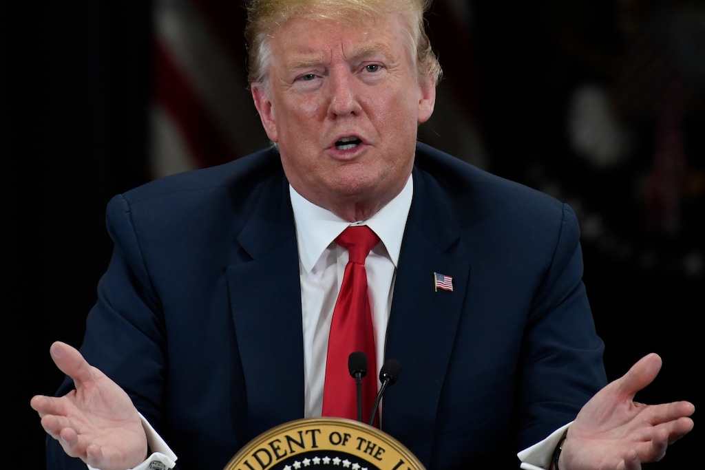 (Susan Walsh | The Associated Press) President Donald Trump speaks at Nuss Truck and Equipment in Burnsville, Minn., Monday, April 15, 2019, during an event to tout the 2017 tax law.