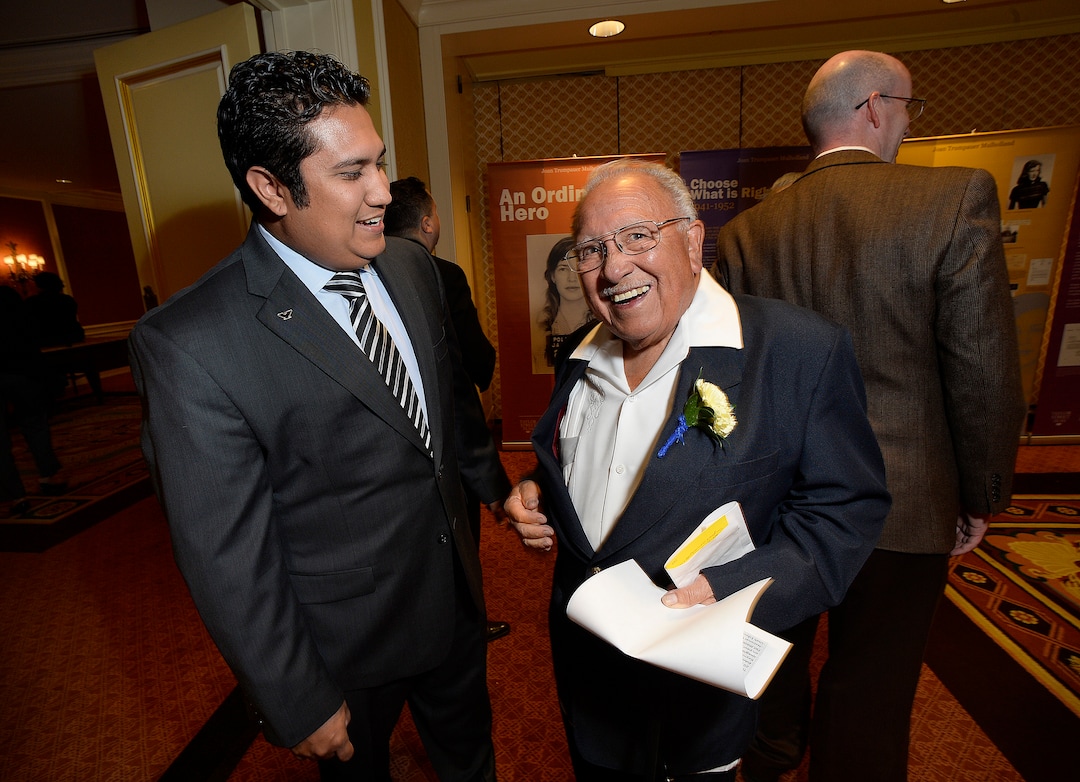 (Scott Sommerdorf   |  Tribune file photo) Nate Salazar, left, of Mayor Biskupski's office, speaks with retired educator, Latino activist, and civil rights advocate Robert "Archie" Archuleta prior to his being presented with the Albert Fritz Civil Rights Worker of the Year Award, by the Salt Lake branch of the NAACP, Friday, October 27, 2017. 
