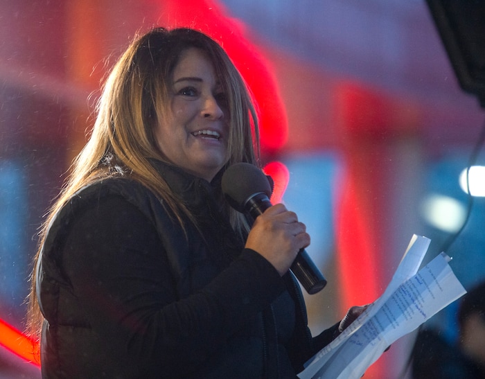 (Rick Egan  |  The Salt Lake Tribune)      Liann May speaks at a candle light vigil for  David Stokoe at the RanLife Home Loans building where he worked in Sandy, Monday, Jan. 21, 2019.