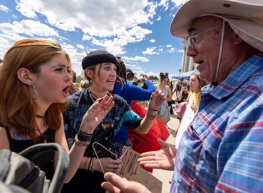 (Rick Egan | The Salt Lake Tribune) Anti-abortion supporters and abortion-rights backers square off at the Utah Capitol  on July 2, 2022. Some Latter-day Saints worry that, in the wake of the end of Roe v. Wade, and abortion will become a divisive topic at church meetings.