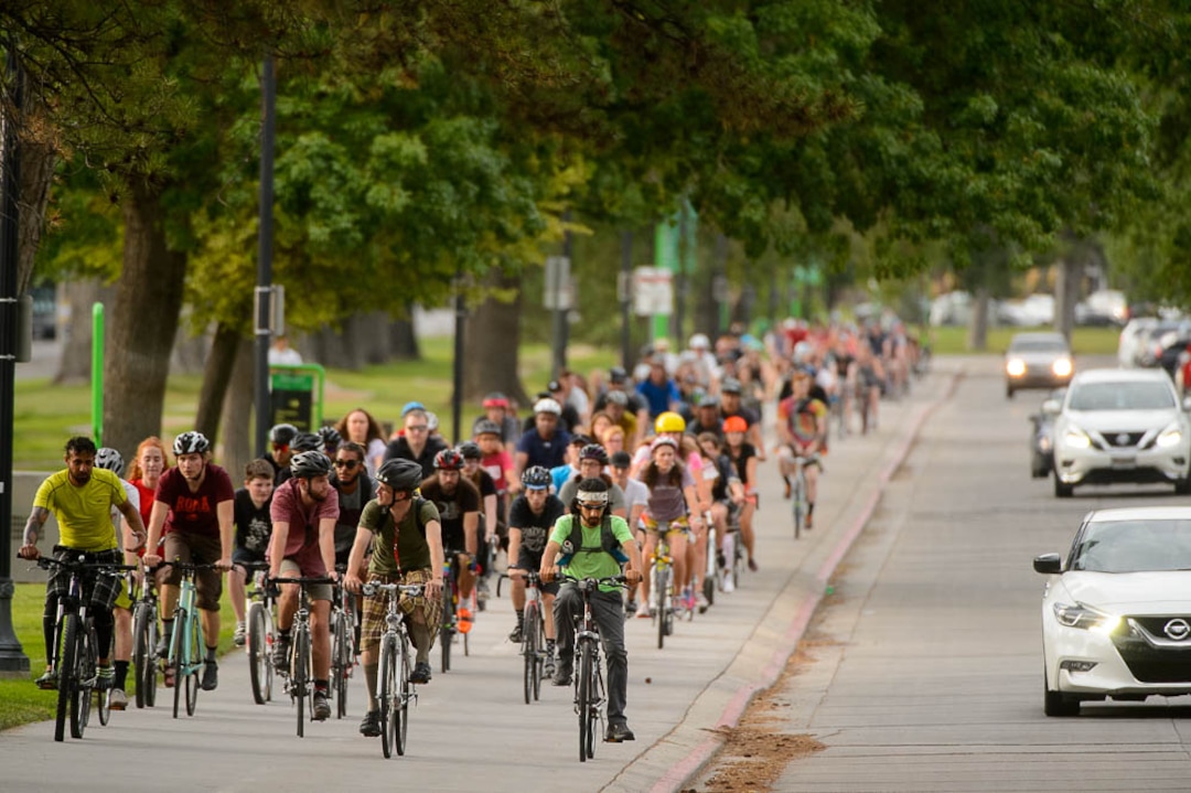 (Trent Nelson | The Salt Lake Tribune)Cyclists gather and ride around Salt Lake City's Liberty Park, Saturday July 21, 2018, in remembrance of Cameron Hooyer, a rider who was killed by a FrontRunner train during a 999 Ride on Thursday.