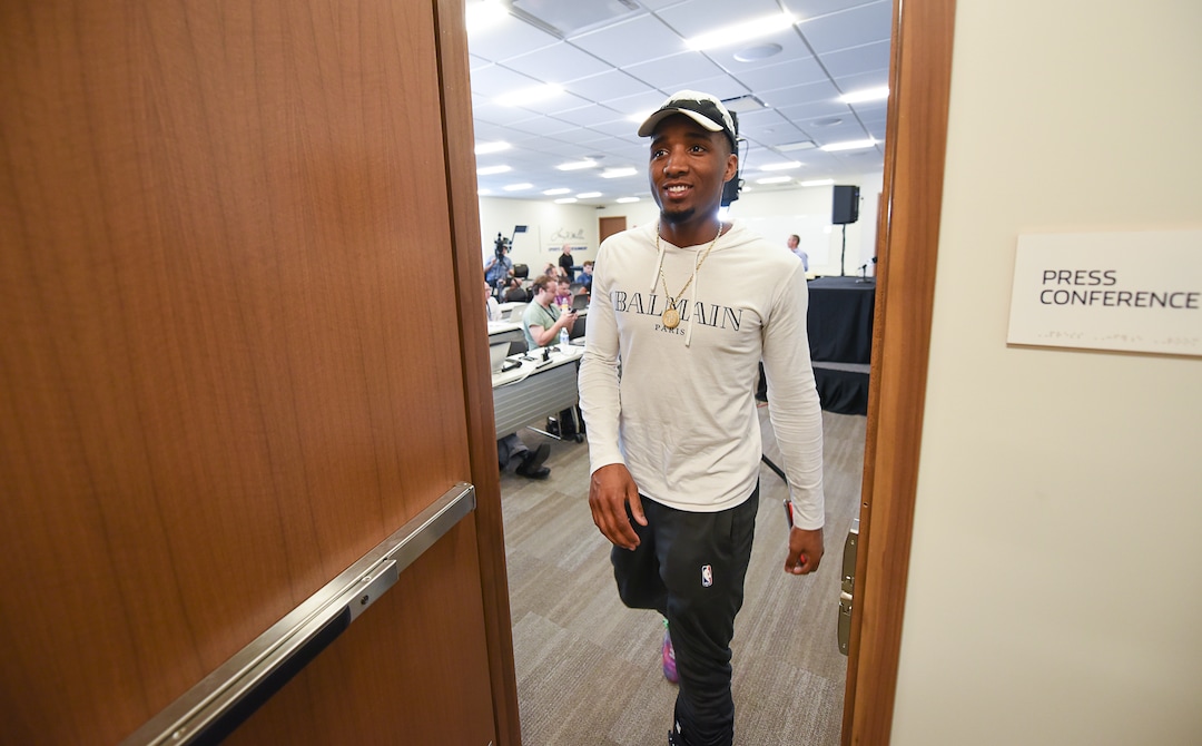 (Francisco Kjolseth  |  The Salt Lake Tribune)  Utah Jazz      guard Donovan Mitchell says his foot is feeling better but wears a boot as a precaution as he finishes with the media during exit interviews at their practice facility in Salt Lake City Wed., May 8, 2018, after losing to the Houston Rockets in game 5 of their Western Conference Finals during the 2018 NBA Playoffs.