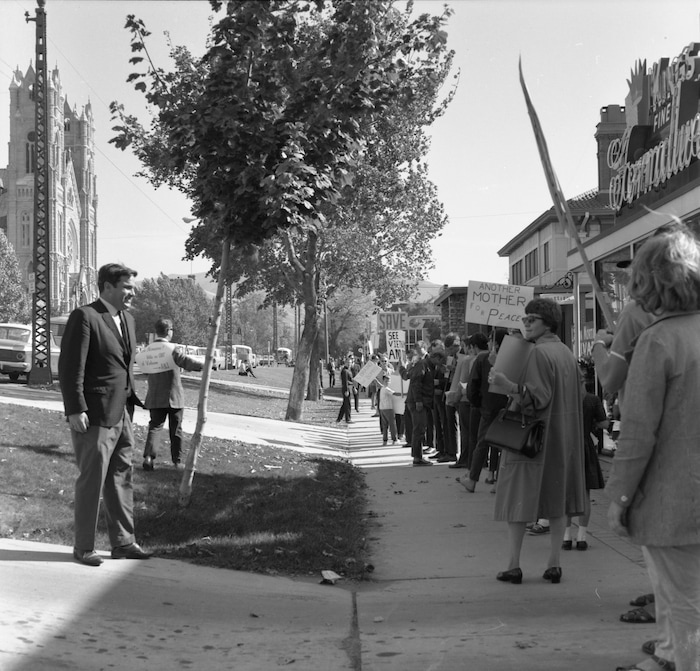 (photo courtesy Joe Bauman)  (photo courtesy Joe Bauman)  A group of Vietnam war protesters led by Ammon Hennacy (not pictured) march to the Cathedral of the Madeleine on Oct. 21, 1967, as a stand against the local diocese's support of the war.