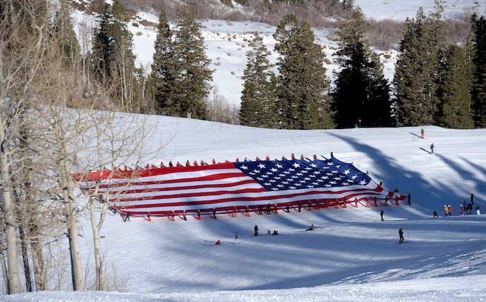 (Al Hartmann  |  The Salt Lake Tribune) 	Sundance Mountain Resort partnered with Follow the Flag to ski a giant American Flag down Bearclaw run. The flag is 78' x 150' and weighs more than 400 pounds, the largest free-flying American flag in the world. It took coordination of 50 of Sundance's best skiers to pull it off.  This event is to express patriotism and support of Team USA and athletes representing the country in the upcoming Winter Olympics in Pyeongchang, South Korea. 