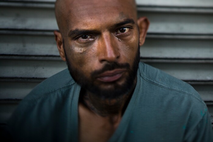 (Jae C. Hong | The Associated Press) Jorge Ortega, 40, poses for a photo Thursday, Oct. 5, 2017, in Los Angeles. Ortega said has been living on the street for more than 10 years after losing his job at the Los Angeles International Airport. Ortega said he has a 14-year-old son living in Washington. His son doesn't know Ortega is homeless, sleeping on a sidewalk of Skid Row.