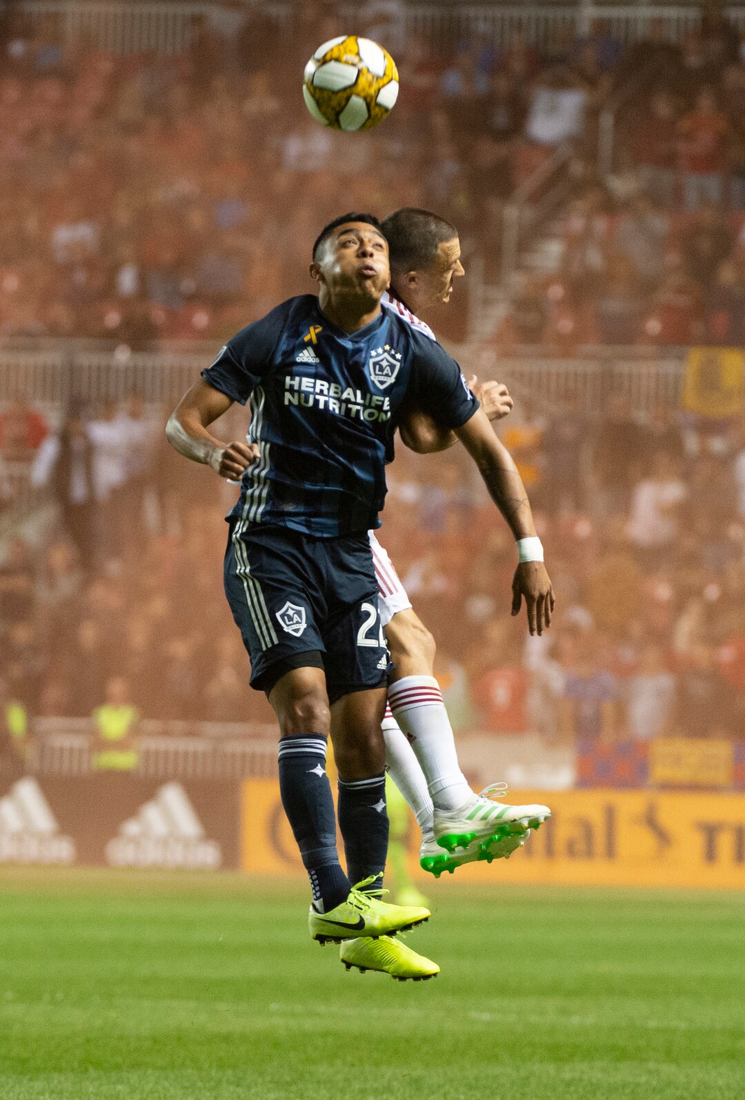 (Rick Egan  |  The Salt Lake Tribune)  Los Angeles Galaxy defender Julian Araujo (22) collides with Real Salt Lake defender Donny Toia (4).  in MLS soccer action between Real Salt Lake and Los Angeles Galaxy at Rio Tinto Stadium, Wednesday, Sept. 25, 2019.