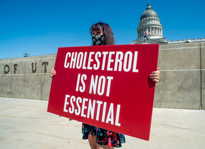 (Rick Egan | The Salt Lake Tribune) Danielle Butler from Ogden, joins a protest at the State Capitol. Physicians Committee asking Gov. Herbert to close meatpacking plants in the state to slow the spread of the coronavirus, Thursday, July 30, 2020.