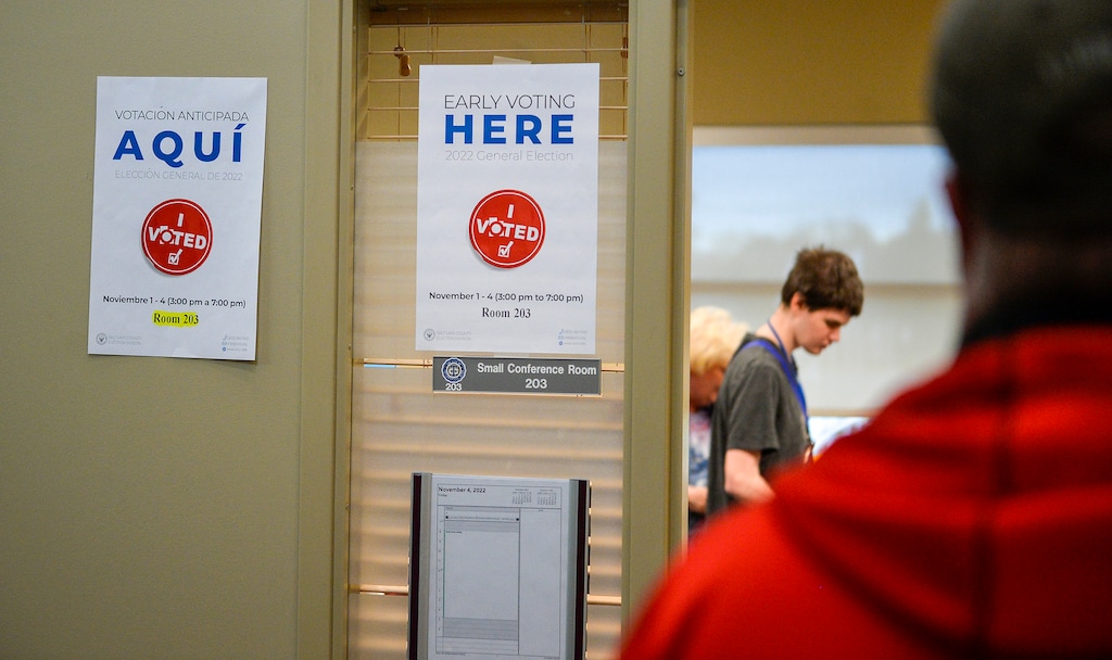 (Chris Samuels | The Salt Lake Tribune) People participate in early voting at Taylorsville City Hall, Friday, Nov. 4, 2022.