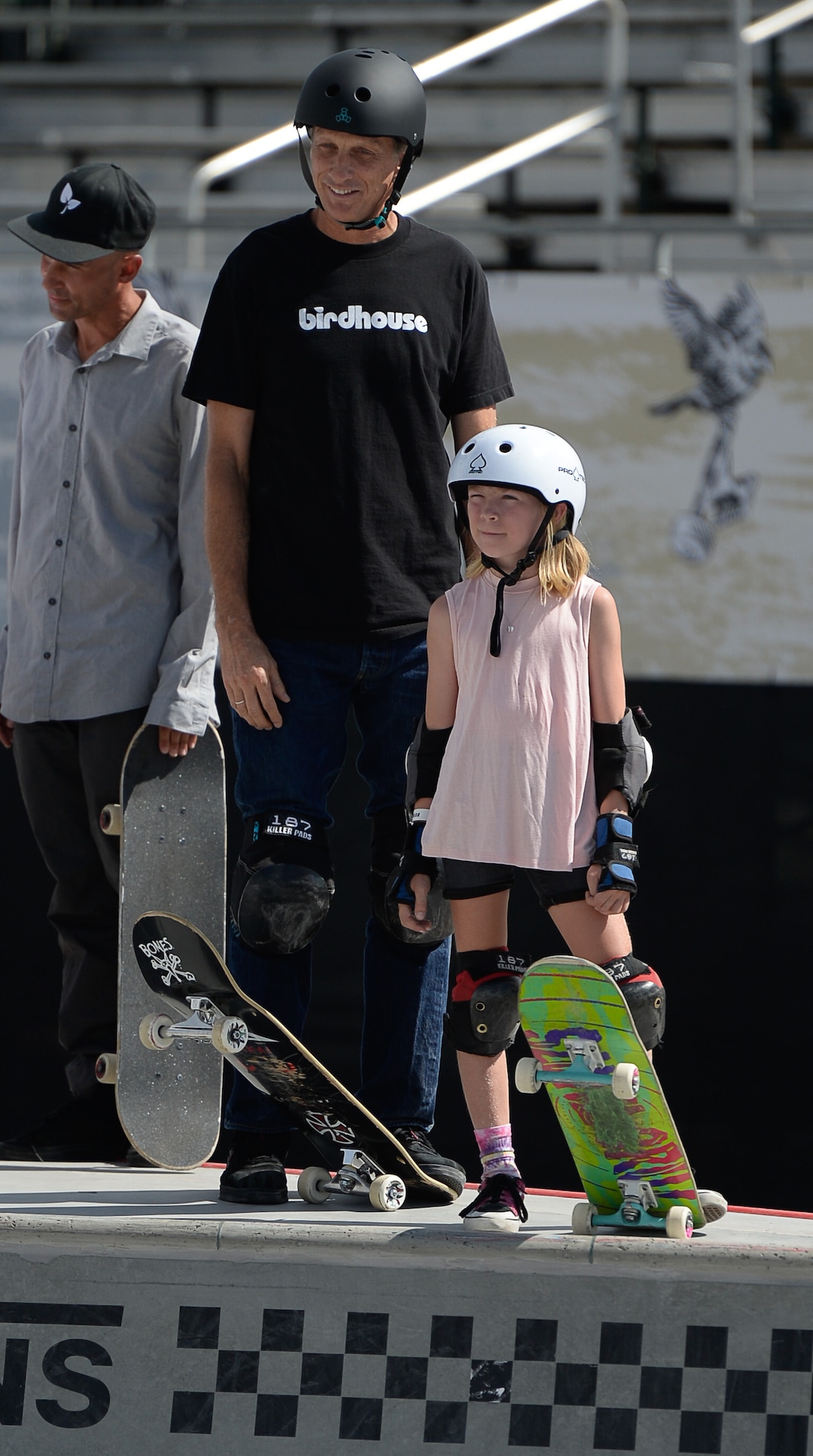 (Francisco Kjolseth  |  The Salt Lake Tribune)  Skate legend Tony Hawk, joins Elle Warne, 10, as they wait their turn to drop in during a first look of the new Vans - Utah Sports Commission Skatepark at the Utah State Fairpark on Tuesday, Sept. 3, 2019.