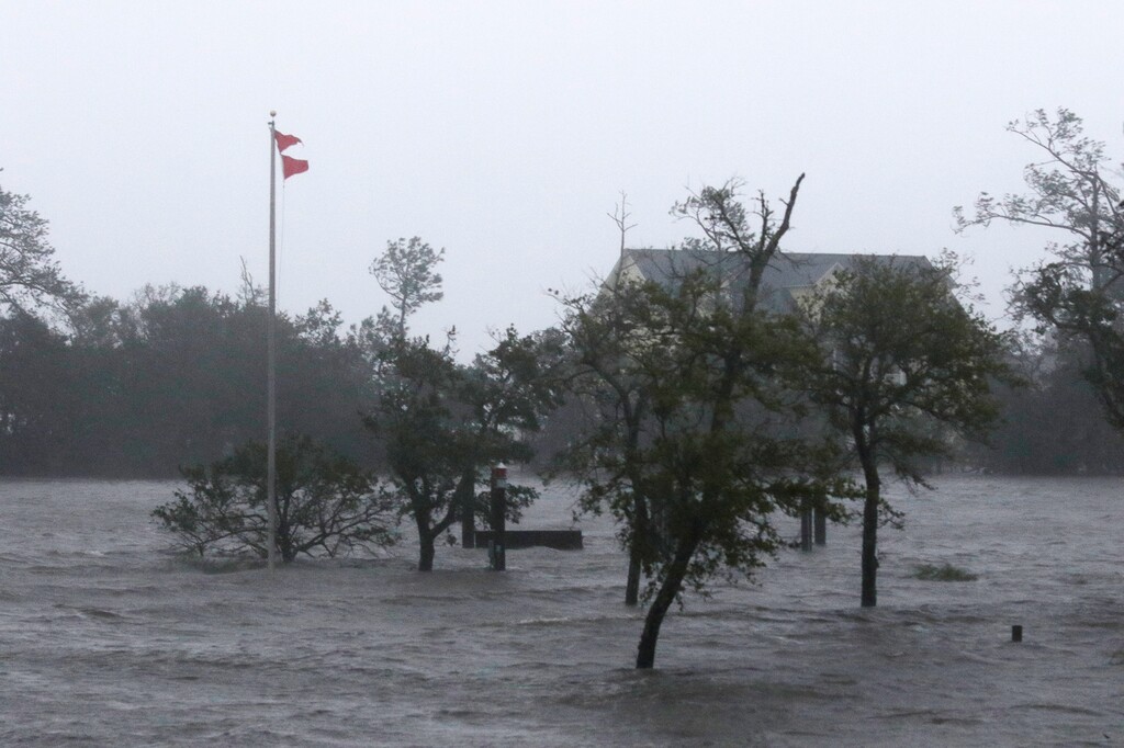 (Tom Copeland | AP Photo) High winds and storm surge from Hurricane Florence hits Swansboro N.C.,Friday, Sept. 14, 2018.