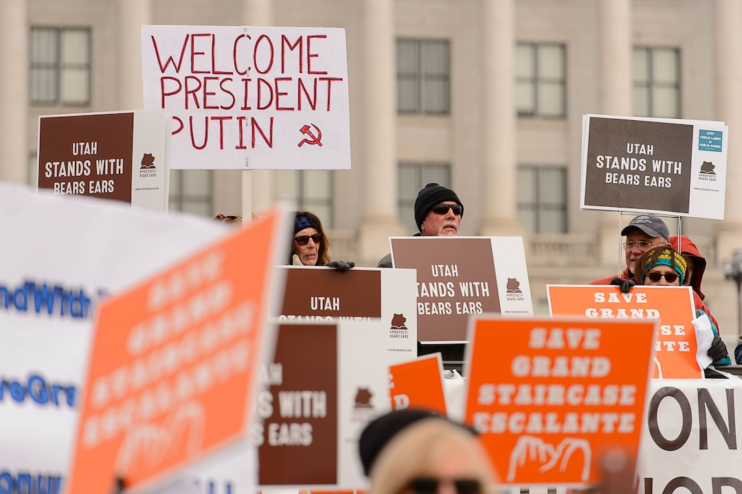 (Trent Nelson | The Salt Lake Tribune)  Protesters gather before a visit by President Donald Trump, Monday December 4, 2017.