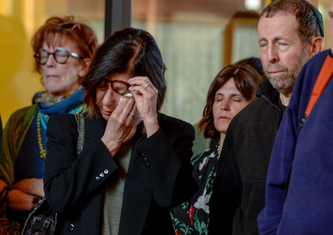 Leah Hogsten  |  The Salt Lake Tribune Joan Kottler wipes away a tear during prayer. Jewish women in Utah at the Chabad Lubavitch of Utah and the world over kindled Shabbat candles, May 3, 2019 in loving tribute to Lori Gilbert-Kaye and in prayer for peace and tolerance amongst all of humanity. Lori Kaye was killed during The Chabad of Poway synagogue shooting on the last day of Passover and three others were injured. Although the lighting of Shabbat Candles is uniquely tasked to the Jewish woman, the  community and those wishing to show their support were welcome to attend.